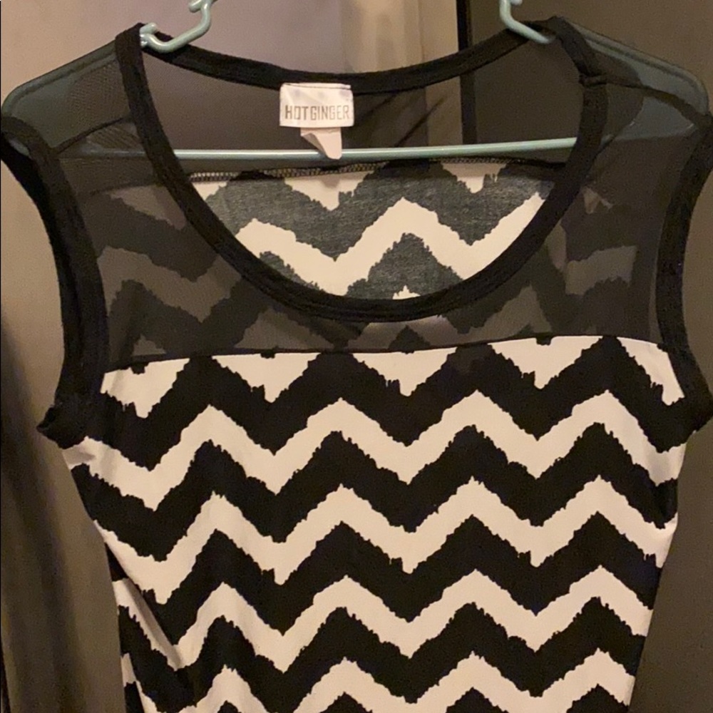 Black and white classy women’s blouse.